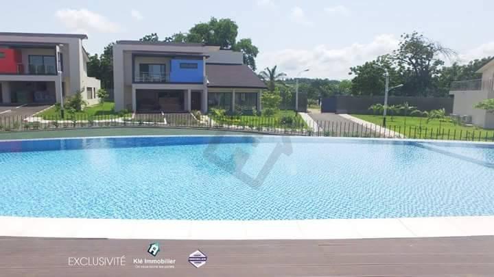 VILLA DUPLEX NEUVE 7 PIÈCES + PISCINE À LA RIVIERA GOLF 4 en Côte d’Ivoire - Photo 1