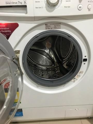 Lg white front load washing machine in Rye - Image 1