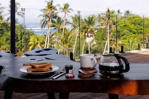4BR Villa w/ Rooftop Ocean & Rice Field View in Denpasar - Image 1