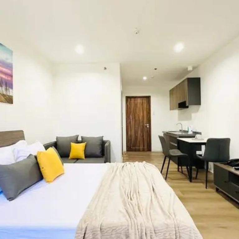 20k FURNISHED STUDIO CONDO FOR RENT IN MACTAN in Consolacion - Image 1