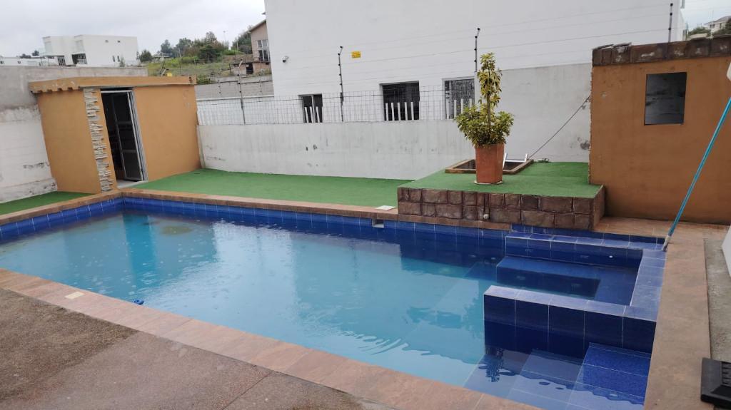 VENDO HERMOSA CASA CON PISCINA Y ESTANQUE en Ecuador - Imagen 7