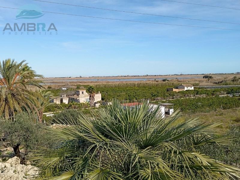 TERRENO RUSTICO CON POSIBILIDAD DE CONSTRUIR 100 METROS en Oliva - Imagen 1