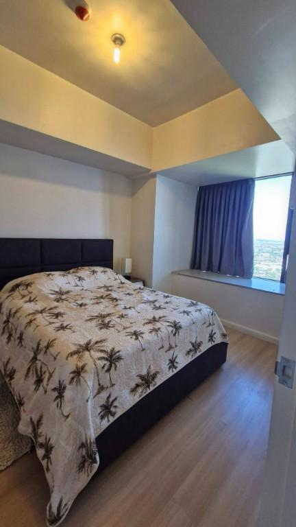 Fully Furnished 1BR for Rent Mandani Bay Tower in Boac - Image 3