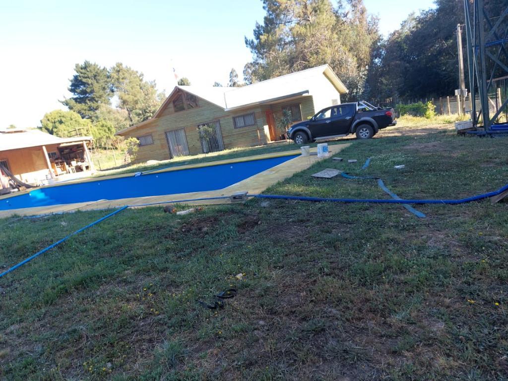 PARCELA HERMOSA 5000 M2 DORMITORIOS 2 PISCINAS en Chile - Imagen 1