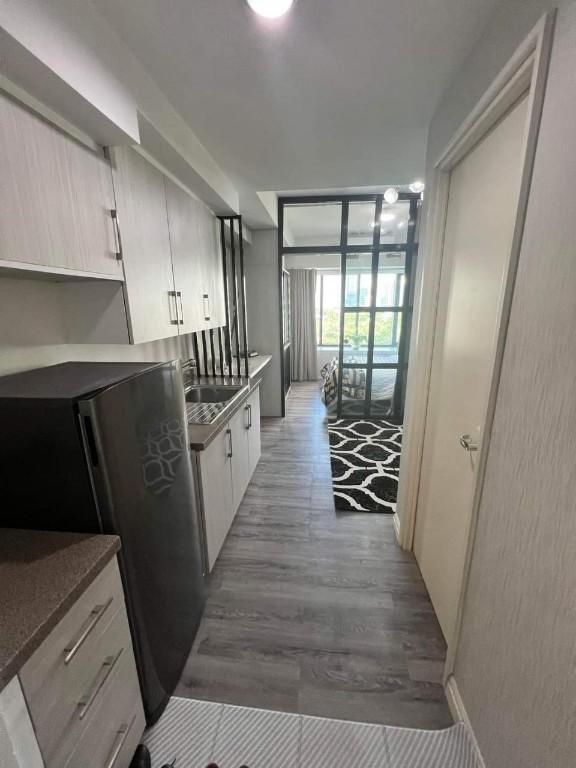 ONE ROCKWELL EAST  STUDIO TYPE CONDO UNIT with PARKING in Pansol - Image 2
