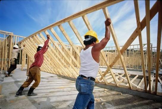 Title Construction Workers Building Frame in Pakistan - Image 1