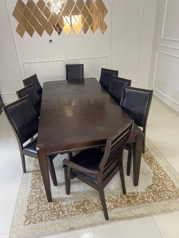 Dining table with eight chairs in United Arab Emirates - Image 2