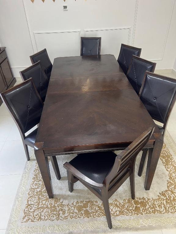 Dining table with eight chairs in United Arab Emirates - Image 4