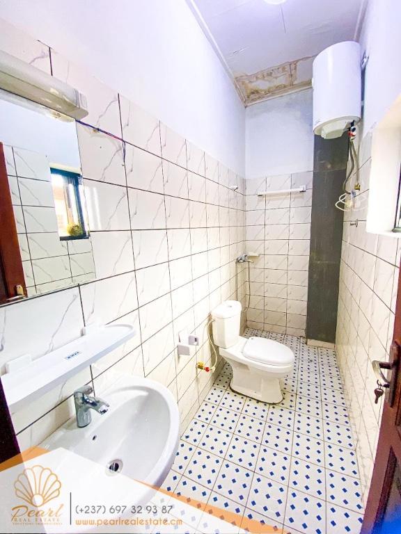APPARTEMENT 2 CHAMBRES – BASTOS, BORDURE DE ROUTE –TRÈS BON PRIX au Cameroun - Photo 6