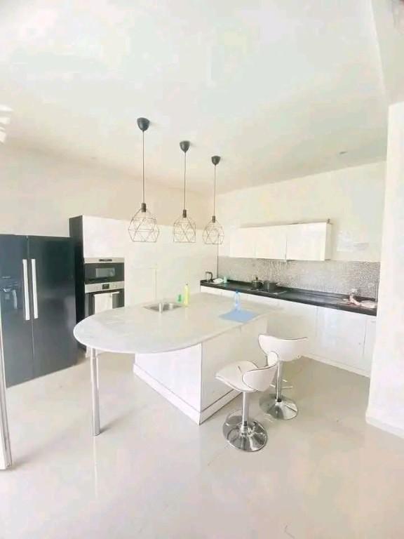 DUPLEX MEUBLÉ À VENDRE AVEC PISCINE au Cameroun - Photo 6