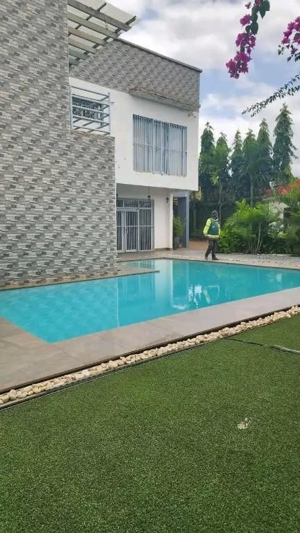DUPLEX MEUBLÉ À VENDRE AVEC PISCINE au Cameroun - Photo 9