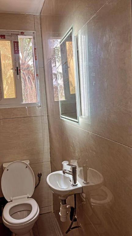 BEL APPARTEMENT TRIPLEX 4 PIÈCES A LOUER A LA RIVIERA PALMERAIE en Côte d’Ivoire - Photo 5