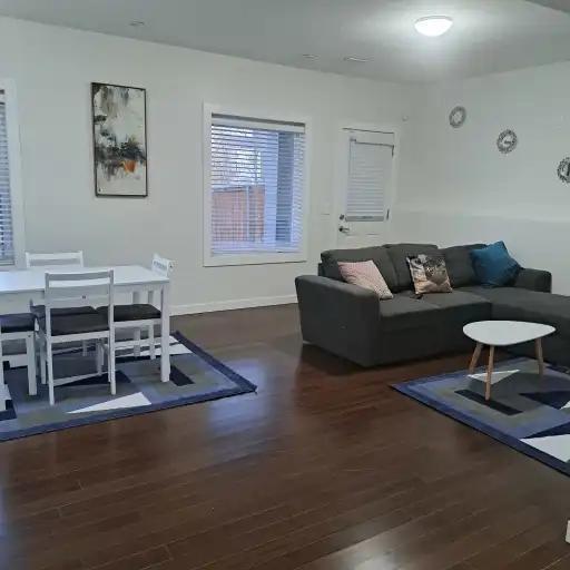 FULLY FURNISHED WALKOUT BASEMENT FOR RENT in Okotoks - Image 1