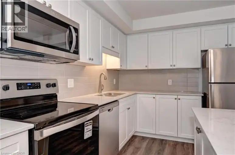 118 GRAVEL RIDGE Trail Unit# B19 in Kitchener - Image 1