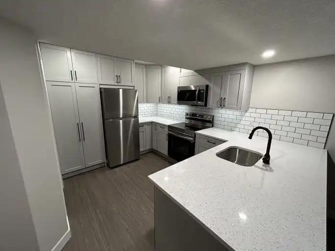 Legal executive basement suite! in Okotoks - Image 1