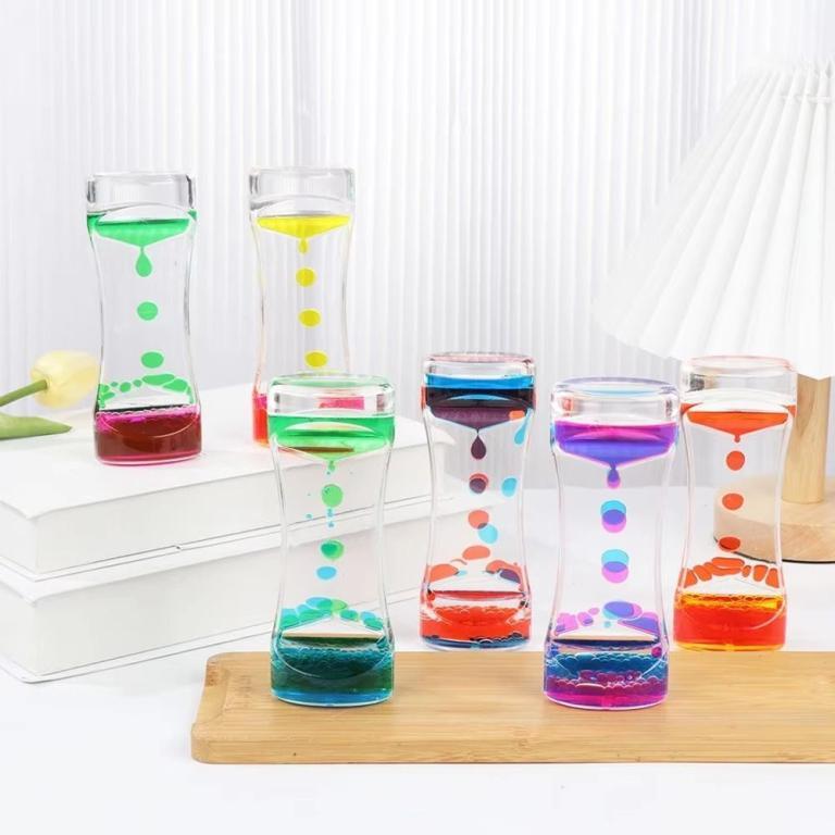 ADAMES Hourglass Timer, Double Colors Oil Creative Floating … in North-Eastern Islands - Image 1