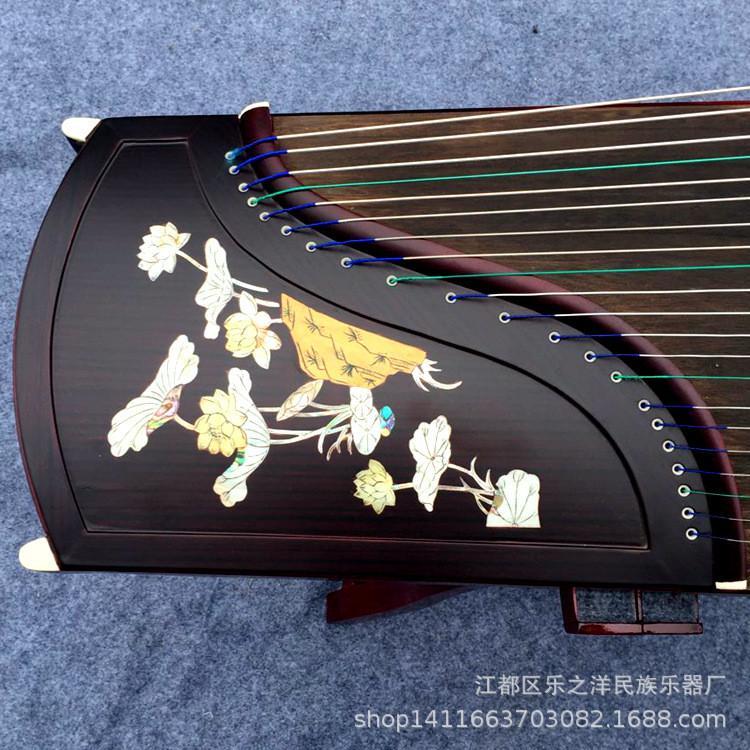 扬州古筝 红木贝雕孔雀登高款高档演奏古筝 考级教学古筝 in Geylang - Image 1