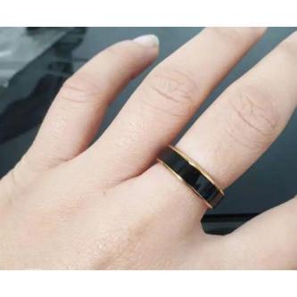 BLACK STAINLESS COUPLE RING WITH SILVER AND YELLOW GOLD … in Singapore - Image 1
