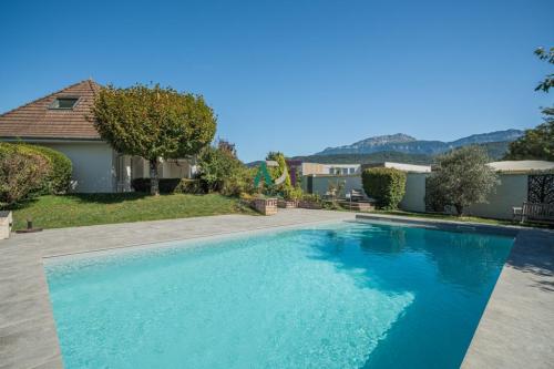 COUBLEVIE MAISON INDIVIDUELLE AVEC PISCINE à Voiron - Photo 1