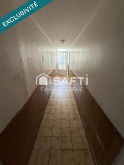 IMMEUBLE DE RAPPORT AVEC 3 LOGEMENTS ET UN JARDIN à Lanester - Photo 1