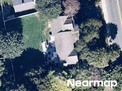 Mills Pond Rd in Smithtown - Image 1