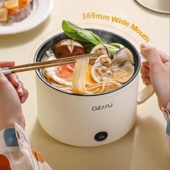 Multifunctional Mini Electric Cooker | Non-Stick Pot for … in Singapore - Image 1