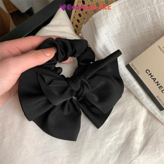 Premium Satin Bow Hair Tie – Elegant Black Ponytail Holder … in Singapore - Image 1
