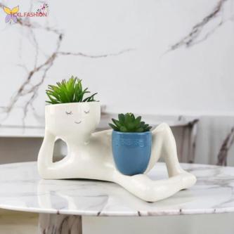 Relaxing Person Holding A Pot Planter Functional Practical … in Singapore - Image 1
