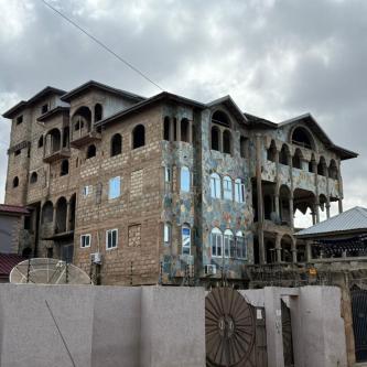 *TITLED COMMERCIAL 54 ROOMS OF ASSORTED APARTMENTS AWOSHIE* in Gbawe - Image 1