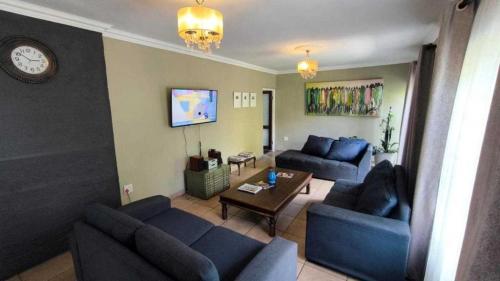 Versatile Family Home with Two Income-Generating Flats in Katlehong - Image 1