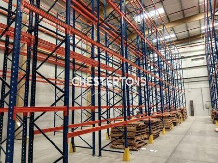 WAREHOUSE FOR RENT I FREEZONEI DWC I WITH RACKING in Dubai - Image 1
